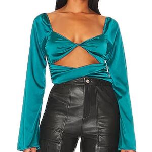Cyntia Twist Front Top in Teal
MORE TO COME size small